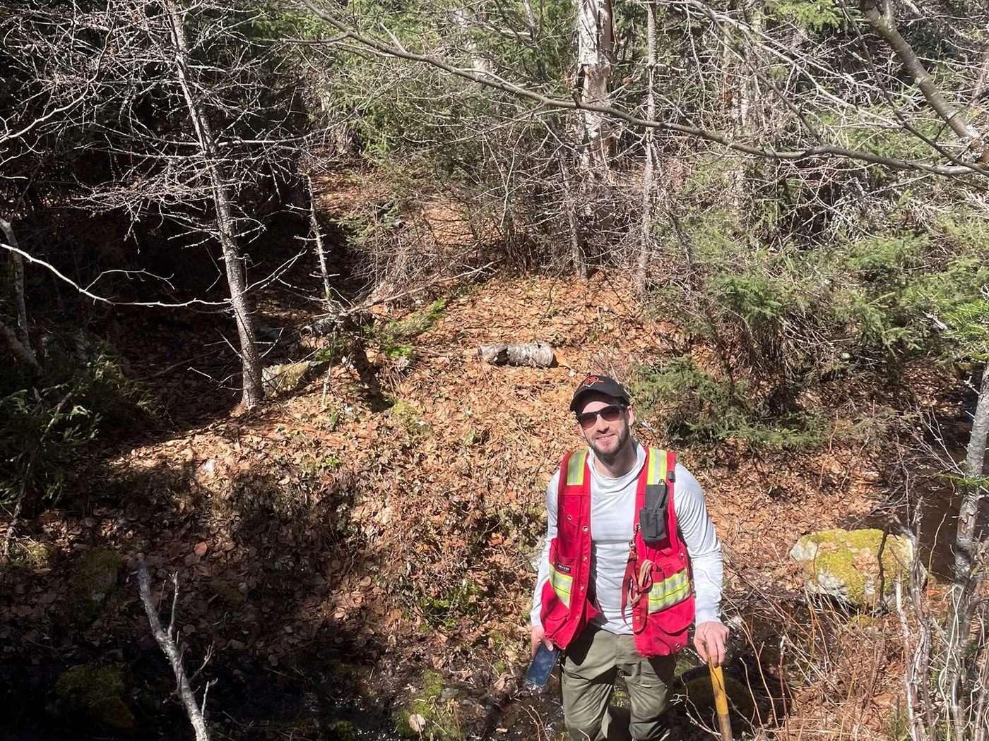 Konrad Chrzastowski completing reconnaissance in forested terrain